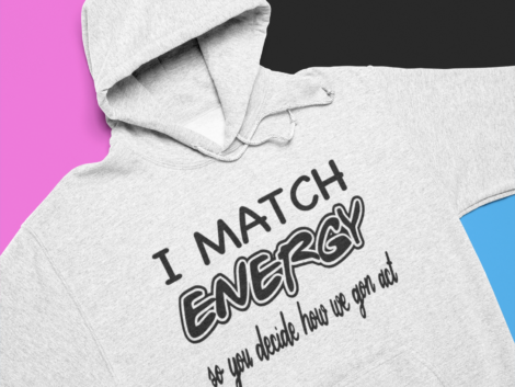 heathered-hoodie-mockup-lying-over-colorful-pasteboards-24729